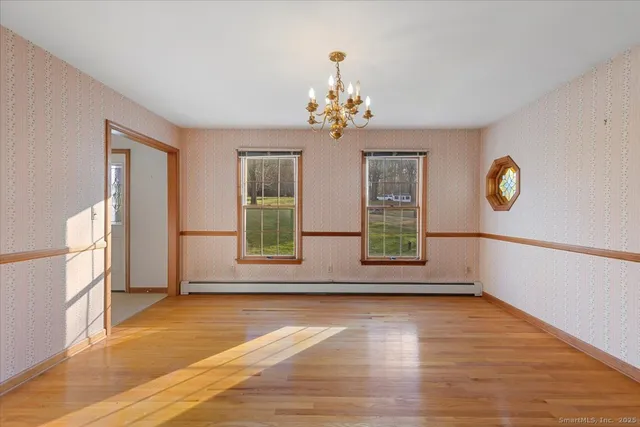 a view of livingroom with hardwood floor and window
