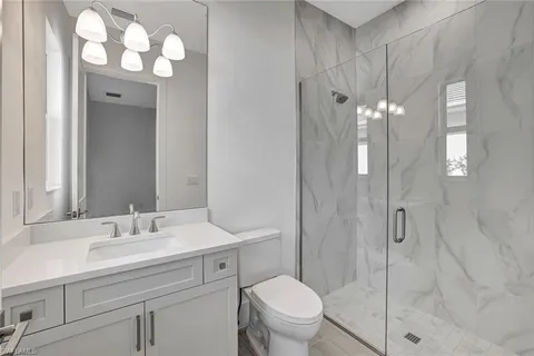 a view of swimming pool with outdoor seating