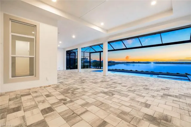an aerial view of a house with a ocean view
