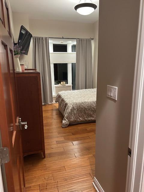 9261 Ruth Court St. John, IN 46373 - Photo 23 of 48 a bedroom with a bed and a television