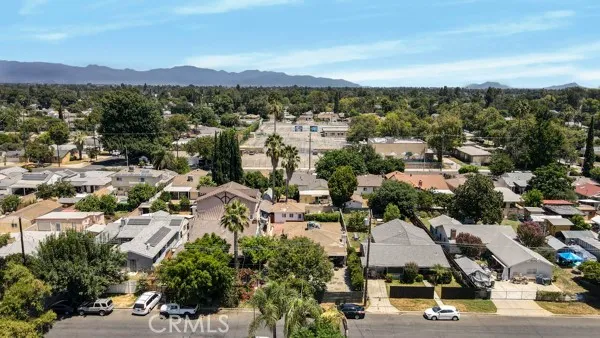a view of a house with a tree