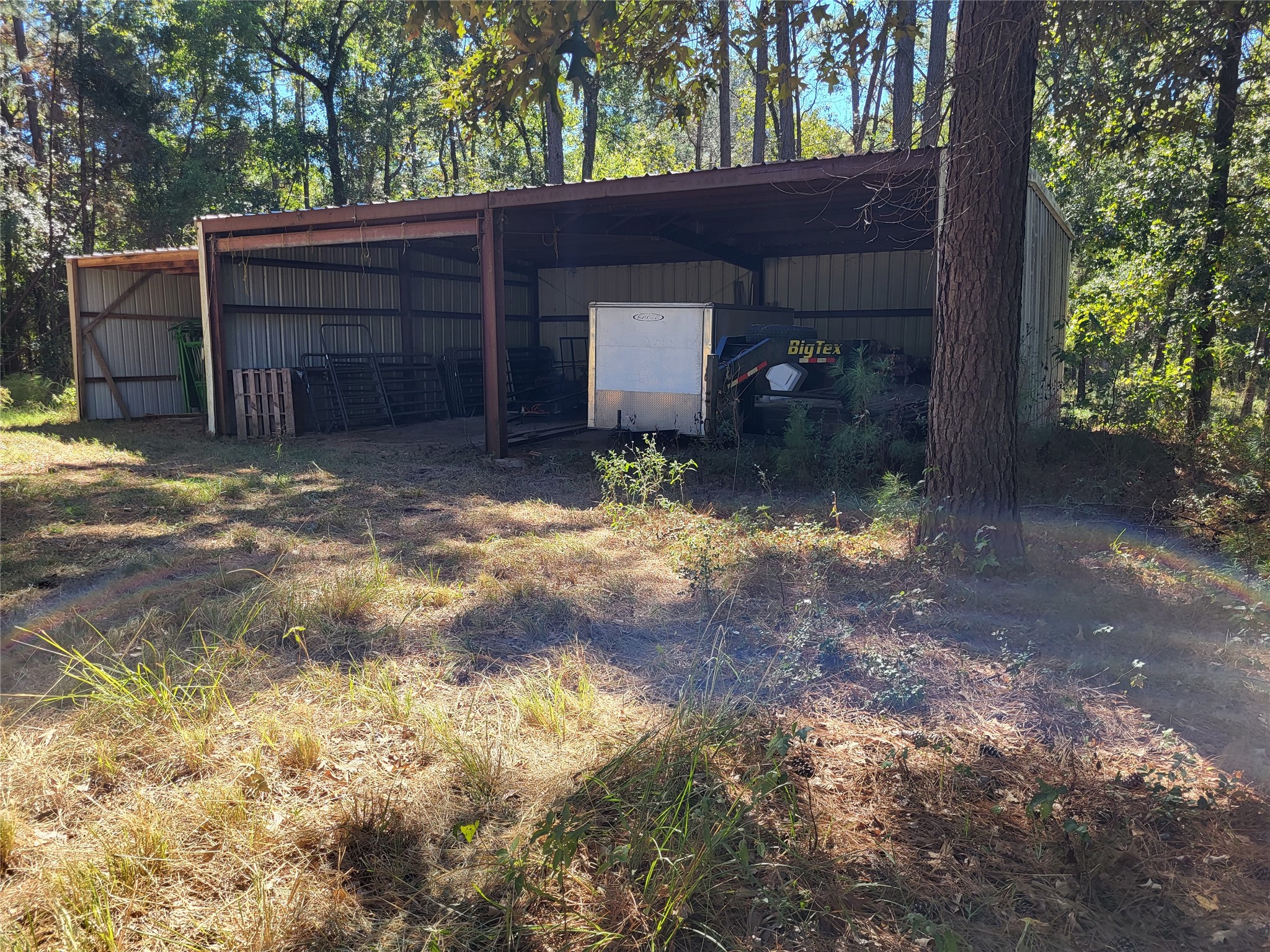 500 South Pine Lake Road Montgomery, TX 77316 - Photo 19 of 38 a view of a house with a yard and garage
