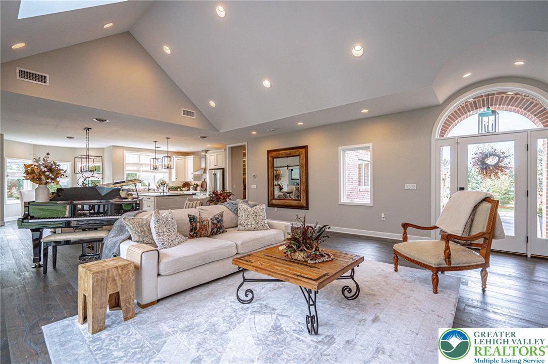 2560 Gracie Lone Lower Macungie Township, PA 18062 - Photo 15 of 68 a living room with furniture a rug and a large window