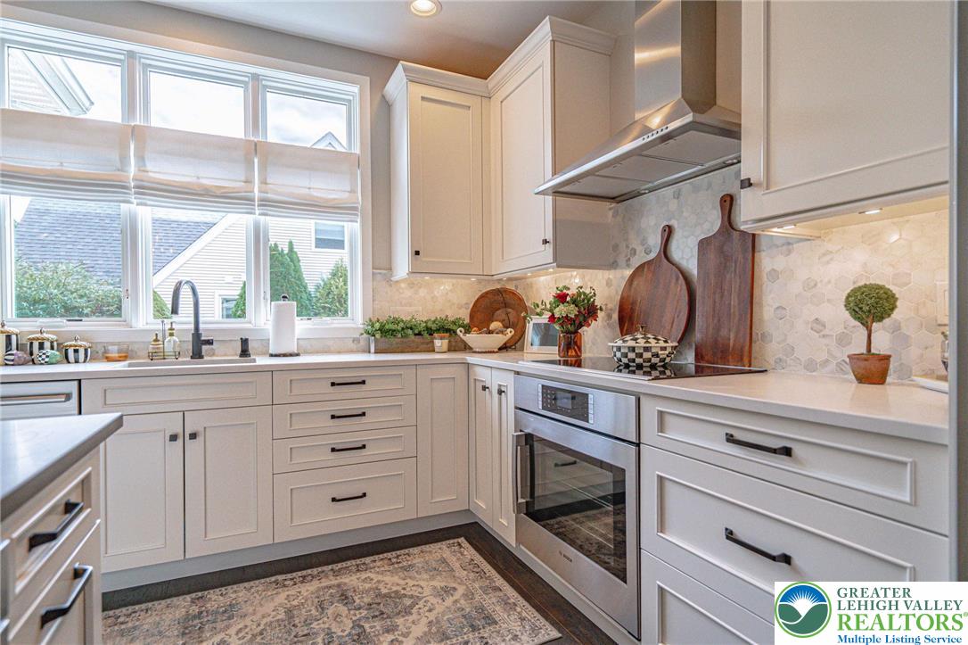 2560 Gracie Lone Lower Macungie Township, PA 18062 - Photo 22 of 68 a kitchen with appliances cabinets and a large window