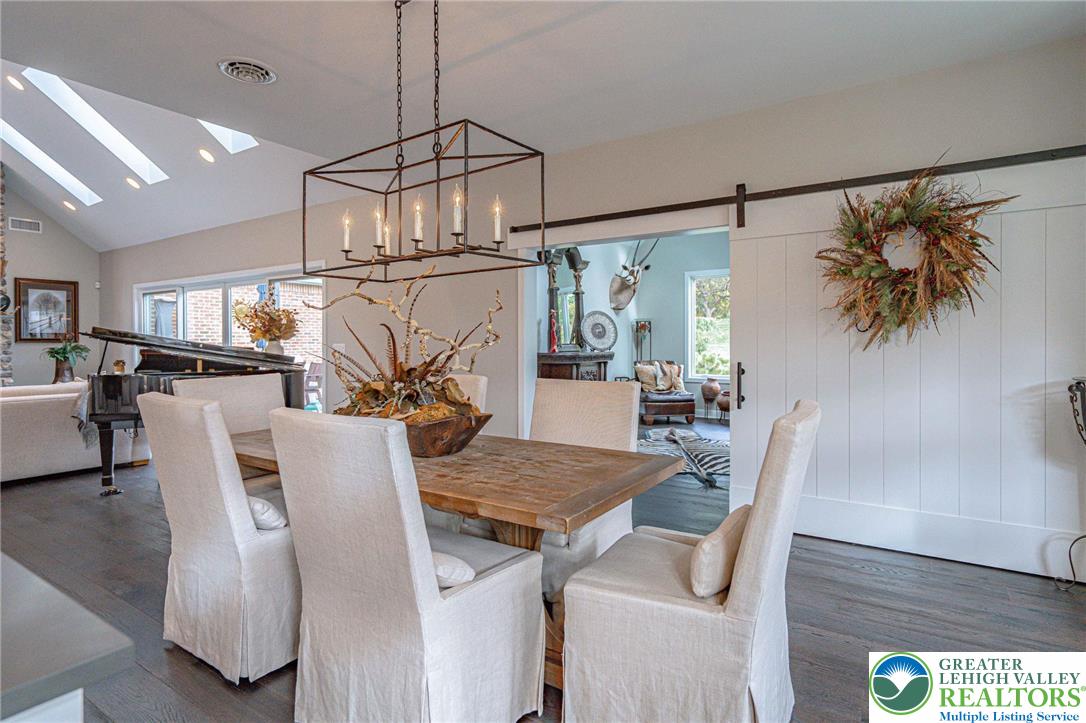 2560 Gracie Lone Lower Macungie Township, PA 18062 - Photo 26 of 68 a view of a dining room with furniture and a chandelier
