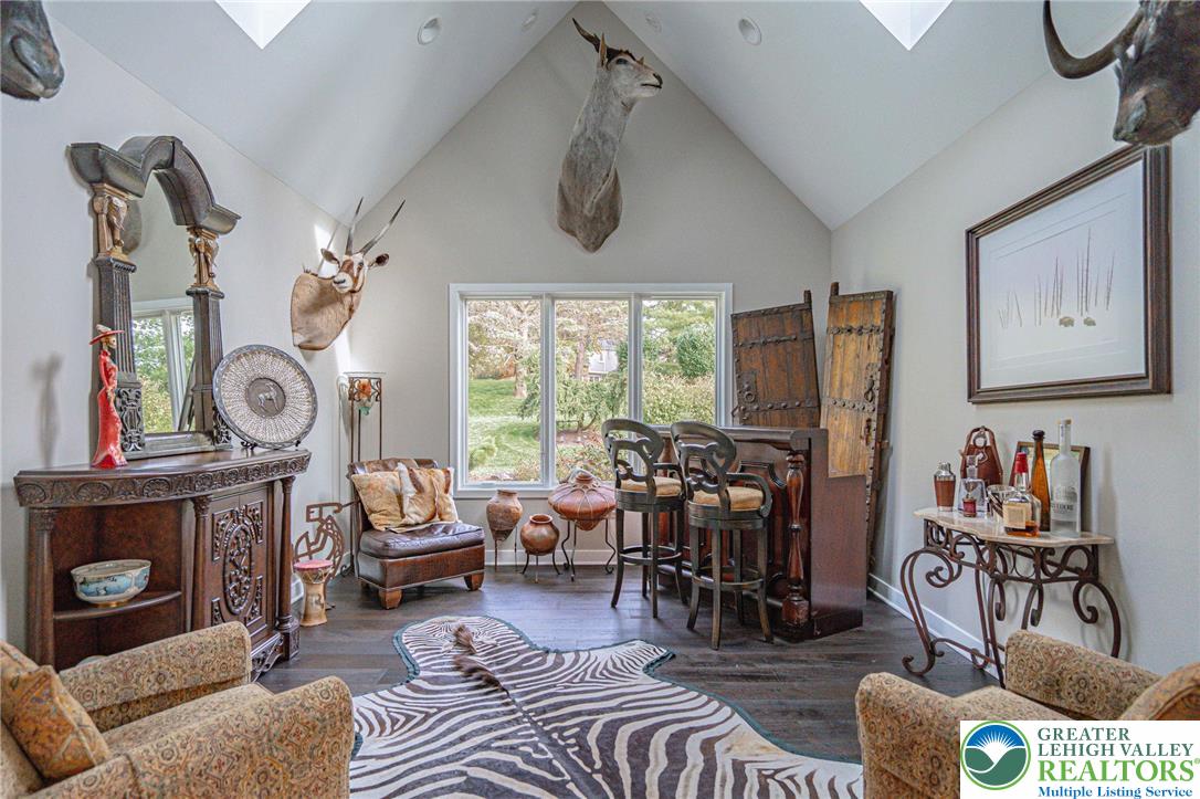 2560 Gracie Lone Lower Macungie Township, PA 18062 - Photo 30 of 68 a living room with furniture a chandelier and a window