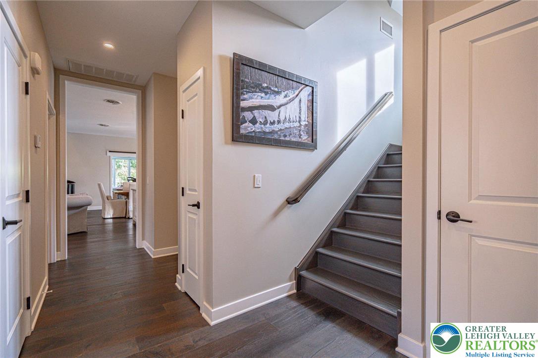 2560 Gracie Lone Lower Macungie Township, PA 18062 - Photo 35 of 68 a view of a hallway with wooden floor and stairs