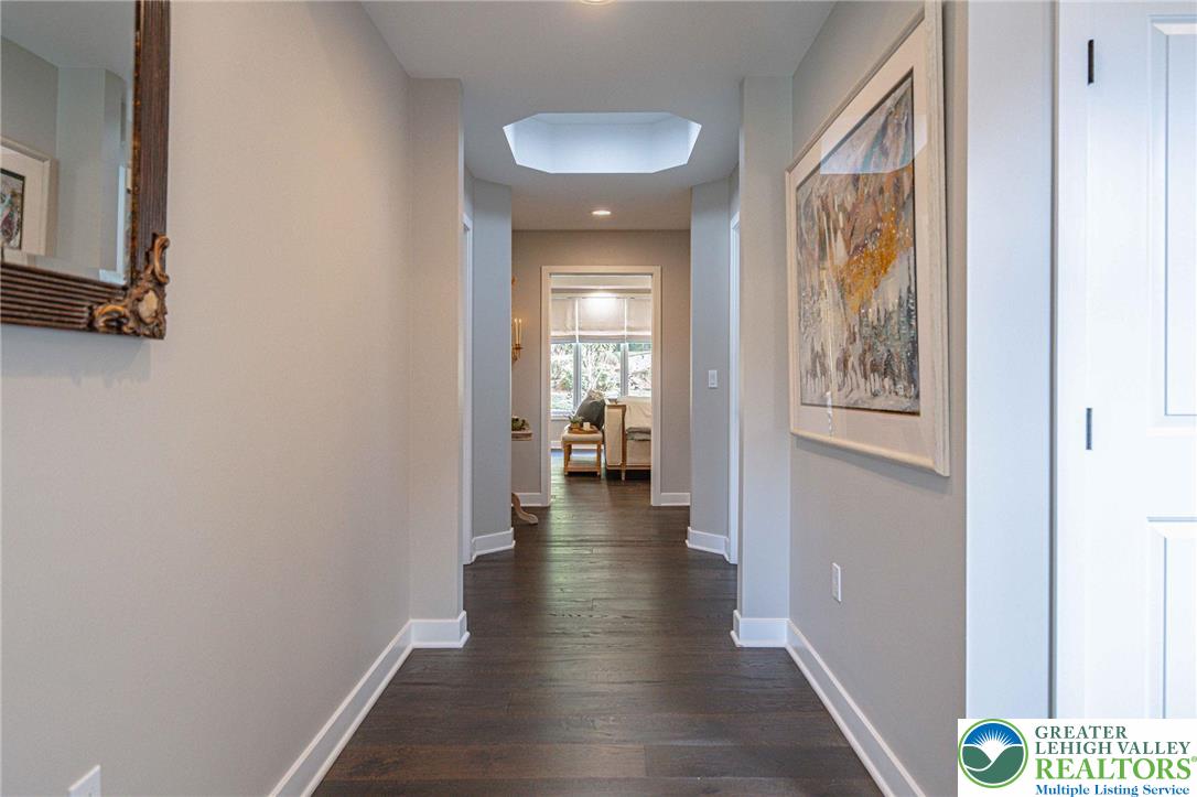 2560 Gracie Lone Lower Macungie Township, PA 18062 - Photo 37 of 68 a view of a hallway with wooden floor and a bathroom
