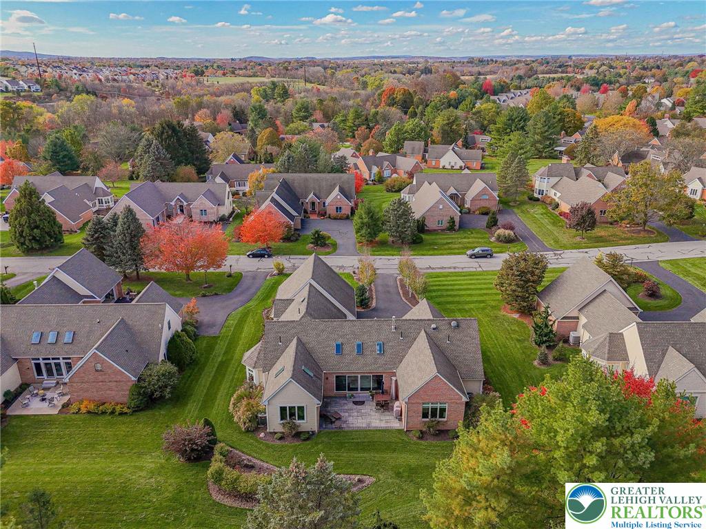 2560 Gracie Lone Lower Macungie Township, PA 18062 - Photo 66 of 68 an aerial view of house with yard swimming pool and outdoor seating
