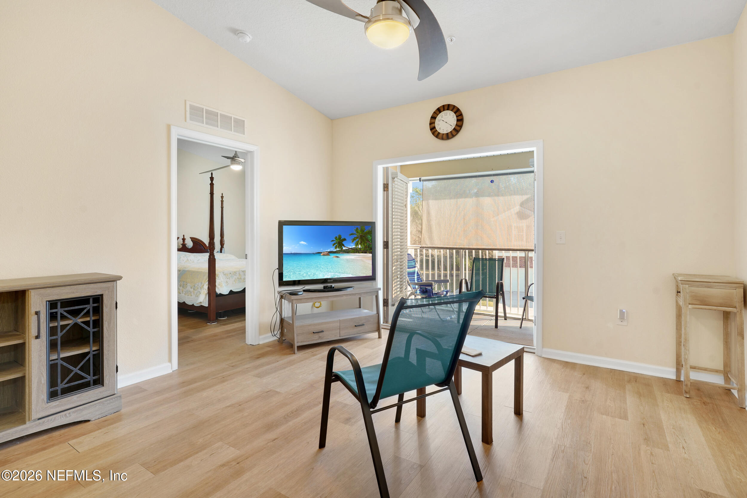 1424 Golden Lake Loop St. Augustine, FL 32084 - Photo 16 of 40 a view of a livingroom with furniture and a flat screen tv
