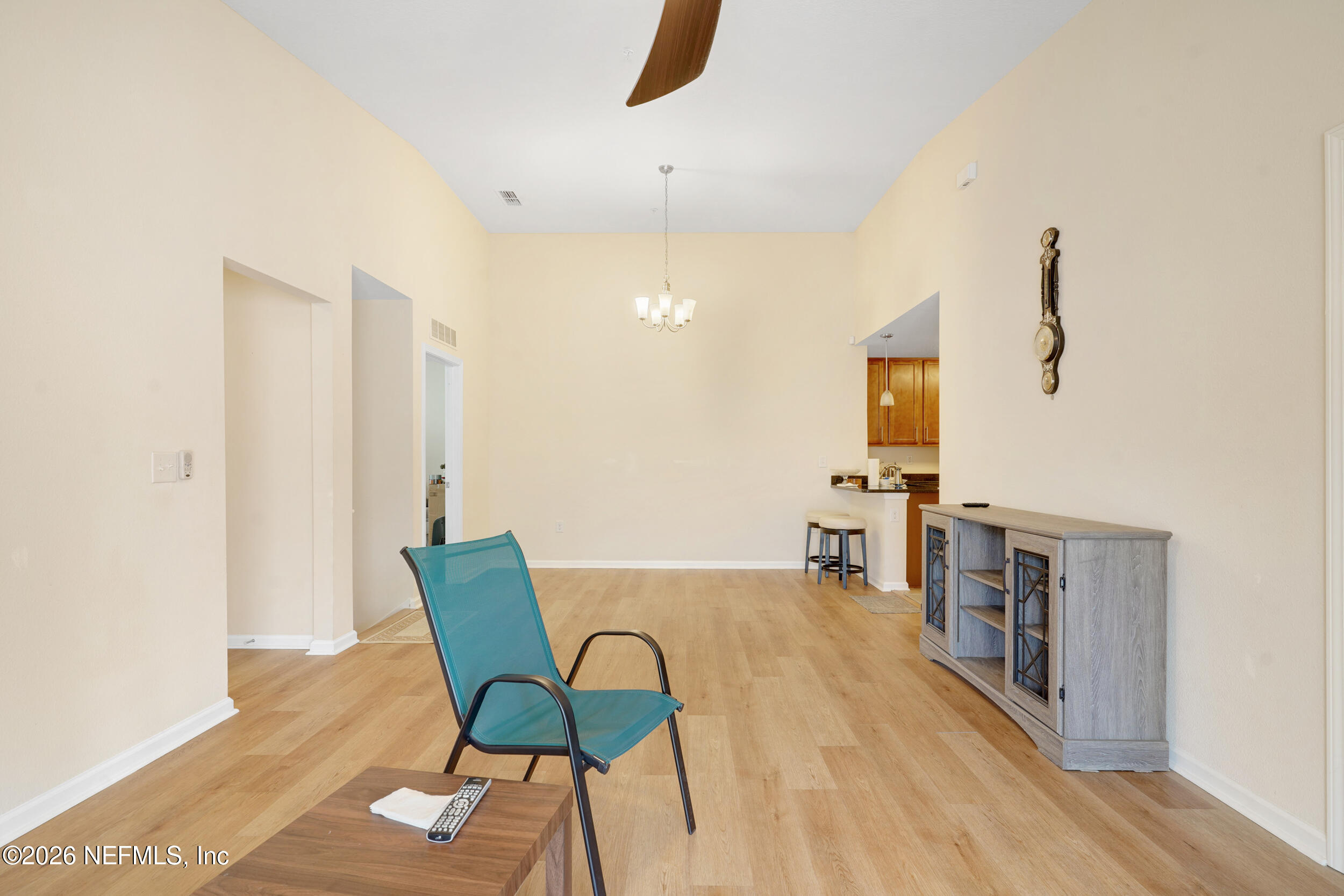 1424 Golden Lake Loop St. Augustine, FL 32084 - Photo 17 of 40 a living room with furniture and a wooden floor