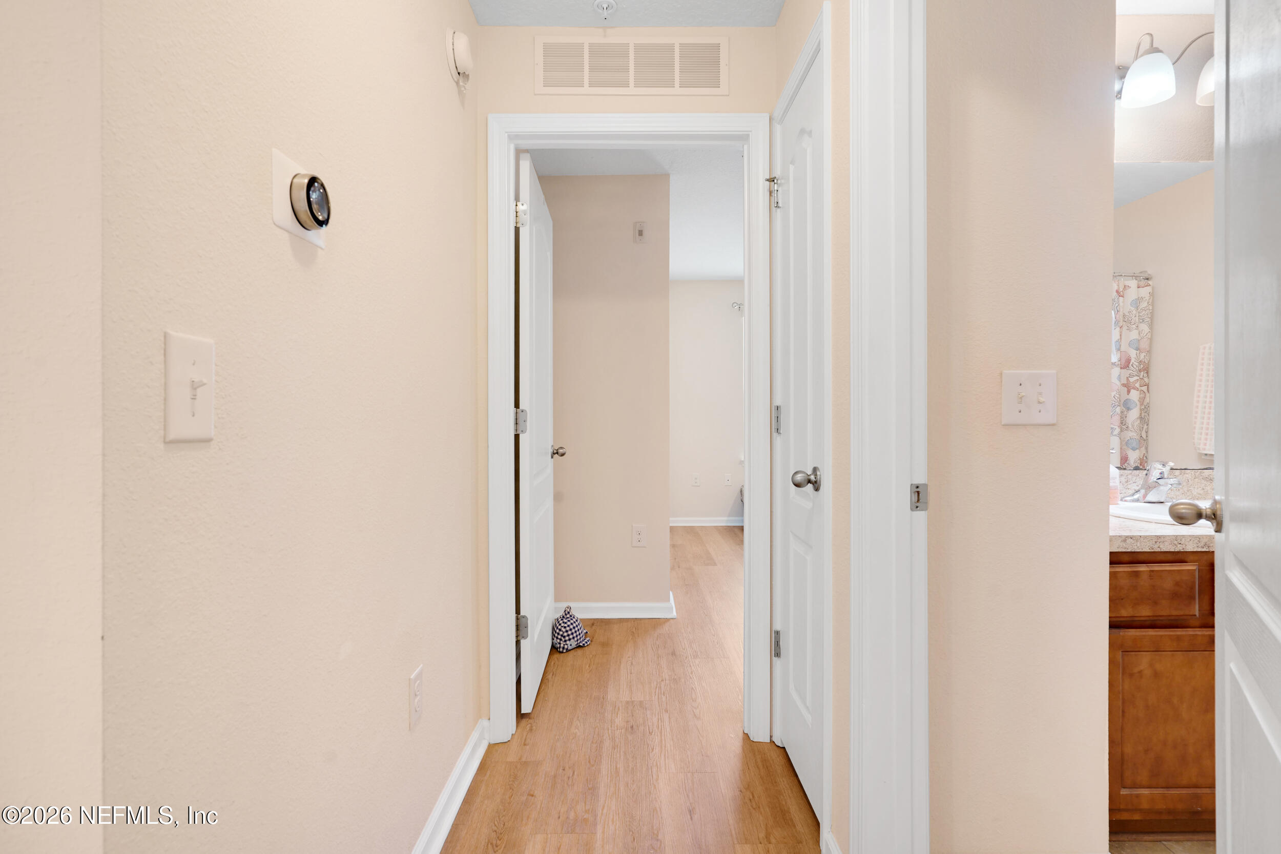 1424 Golden Lake Loop St. Augustine, FL 32084 - Photo 28 of 40 a view of a bathroom from a hallway