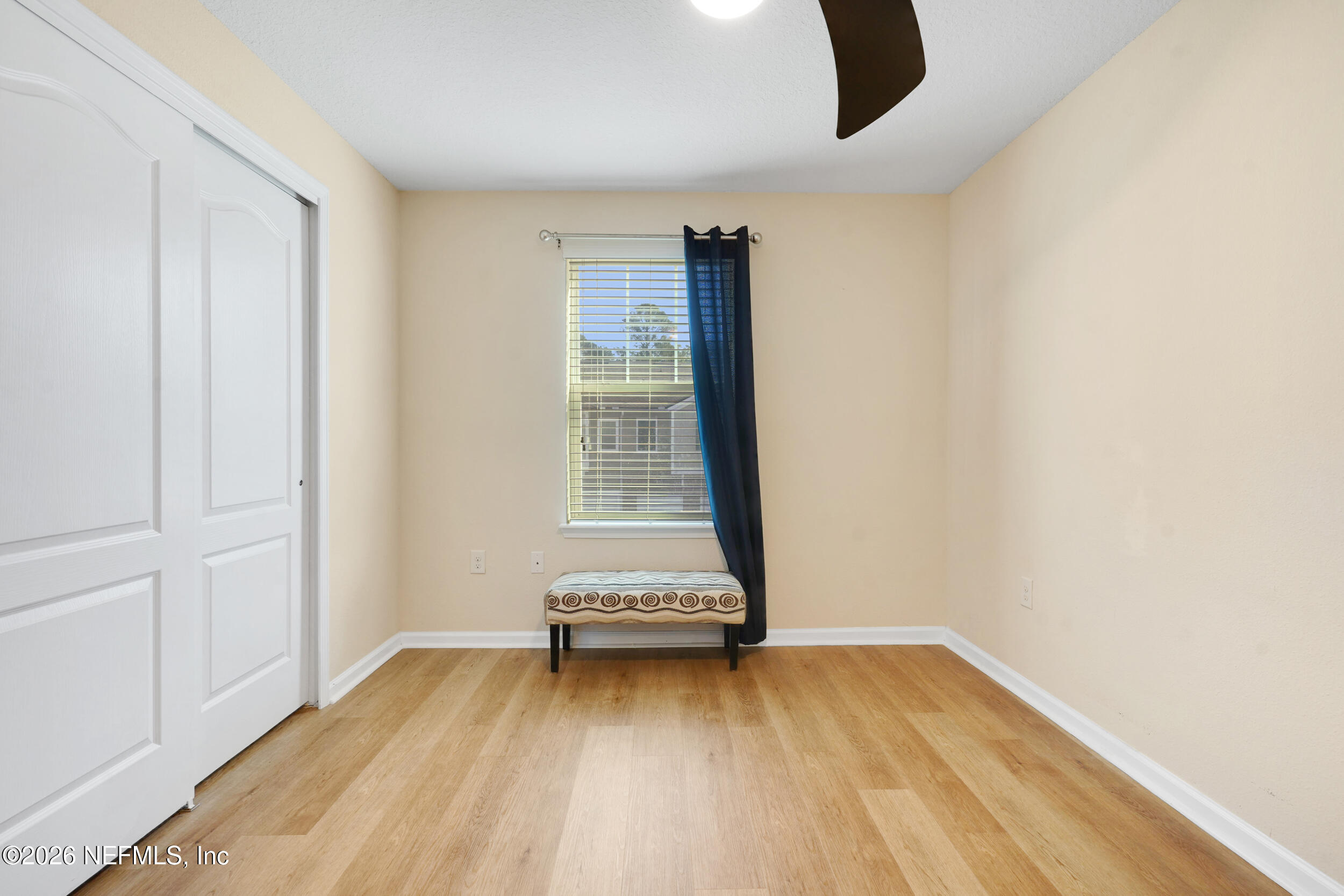 1424 Golden Lake Loop St. Augustine, FL 32084 - Photo 30 of 40 a view of a room with wooden floor and a window
