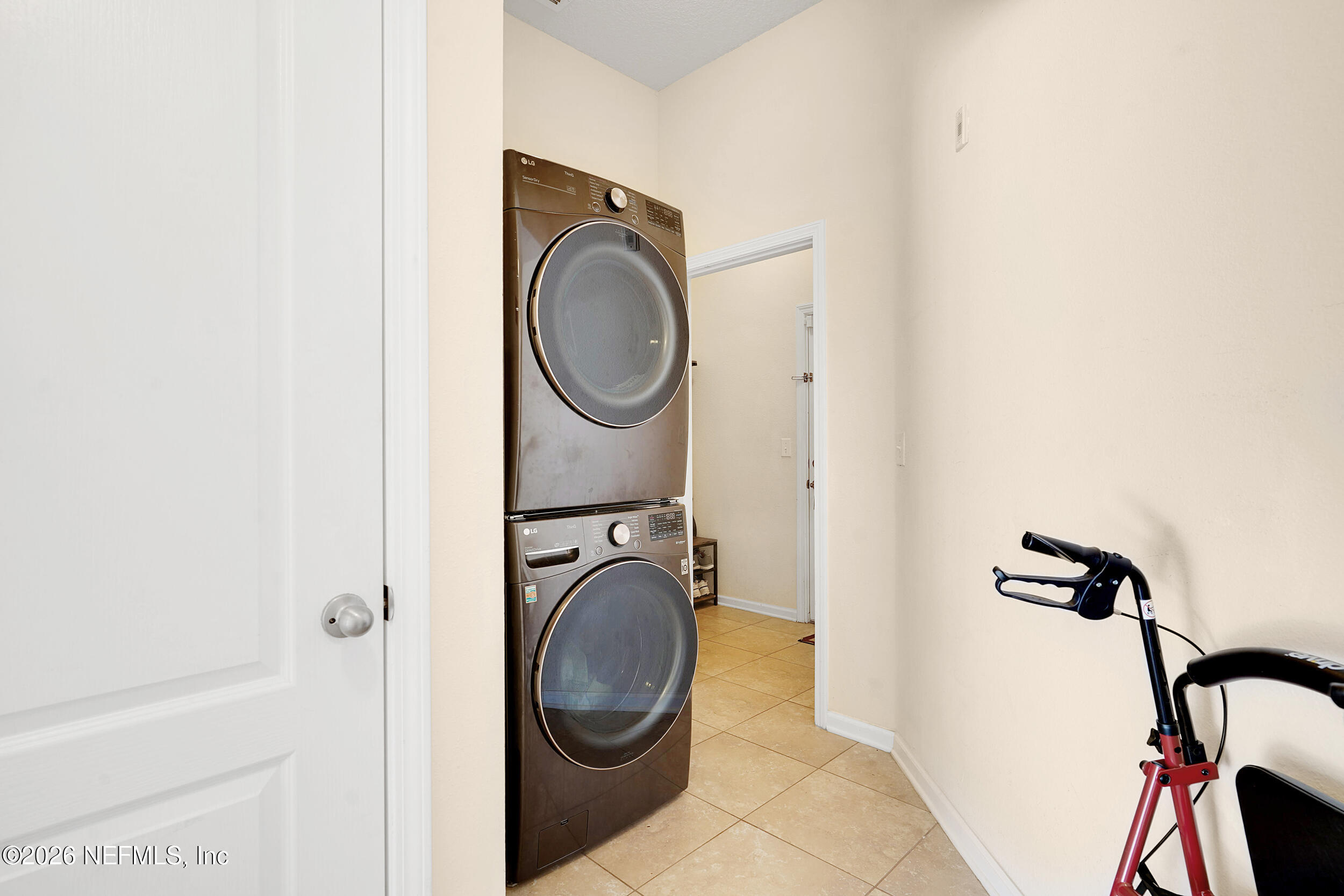 1424 Golden Lake Loop St. Augustine, FL 32084 - Photo 33 of 40 a utility room with dryer and washer