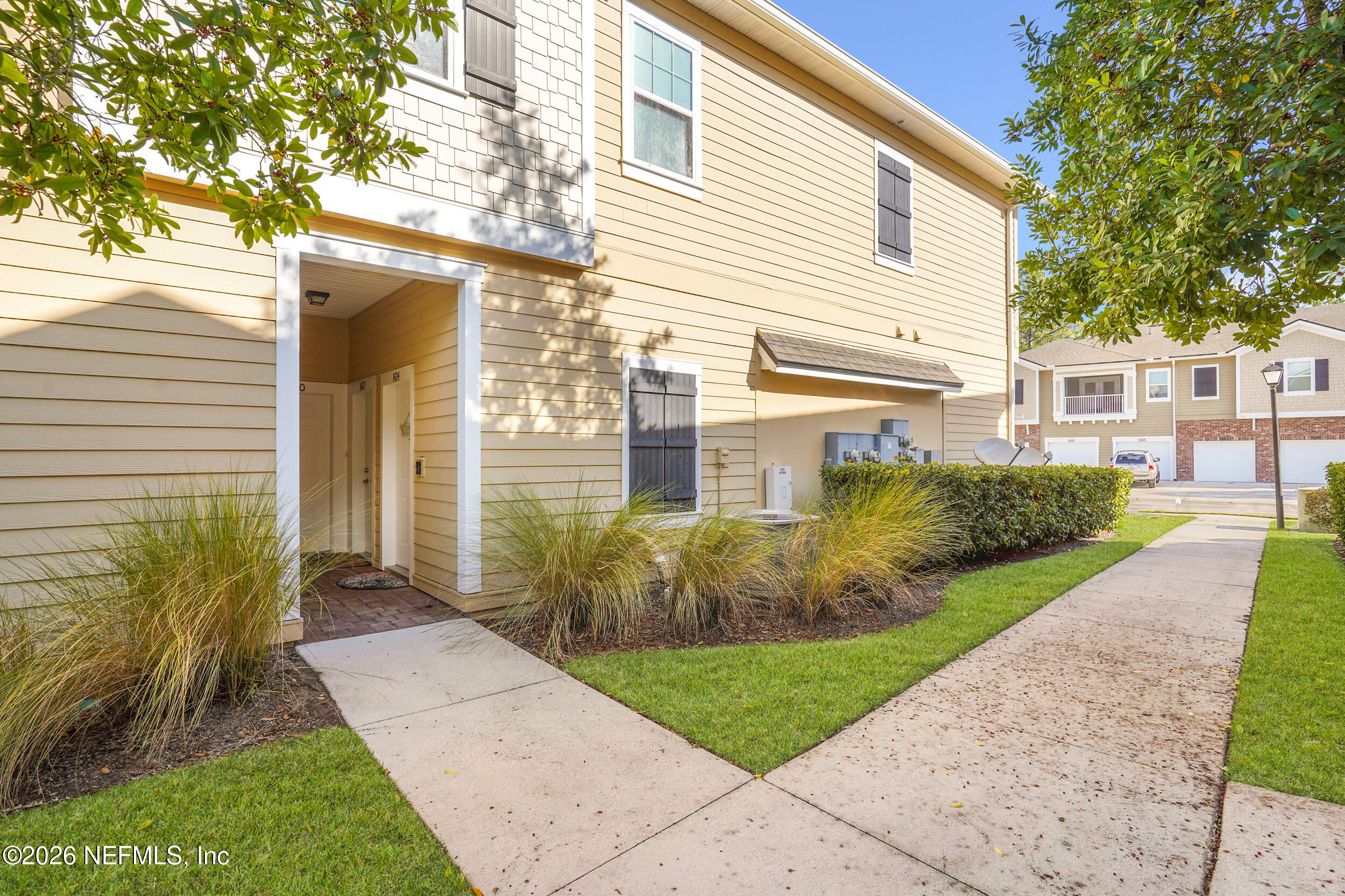 1424 Golden Lake Loop St. Augustine, FL 32084 - Photo 36 of 40 a view of a house with a yard