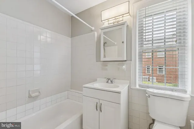 a bathroom with a sink and a bathtub