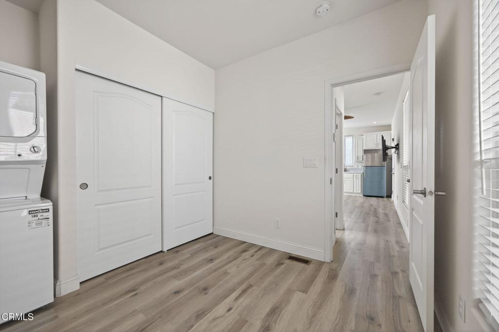 3975 Telegraph Road, Unit 2 Ventura, CA 93003 - Photo 12 of 21 wooden floor in an empty room