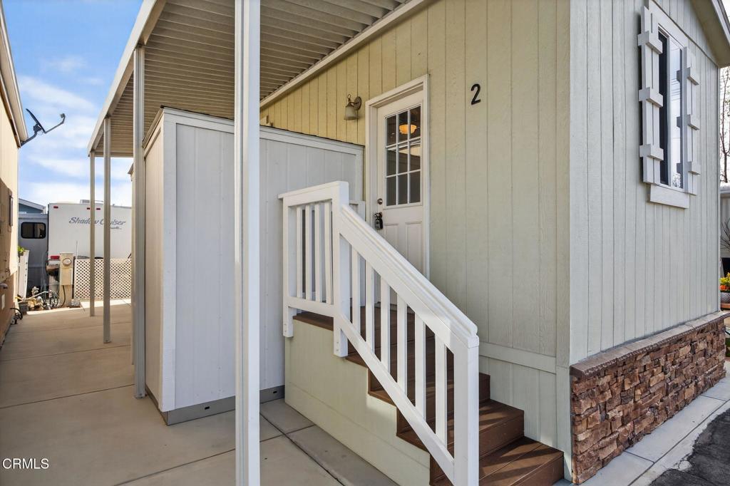 3975 Telegraph Road, Unit 2 Ventura, CA 93003 - Photo 4 of 21 a view of staircase with railing and white walls