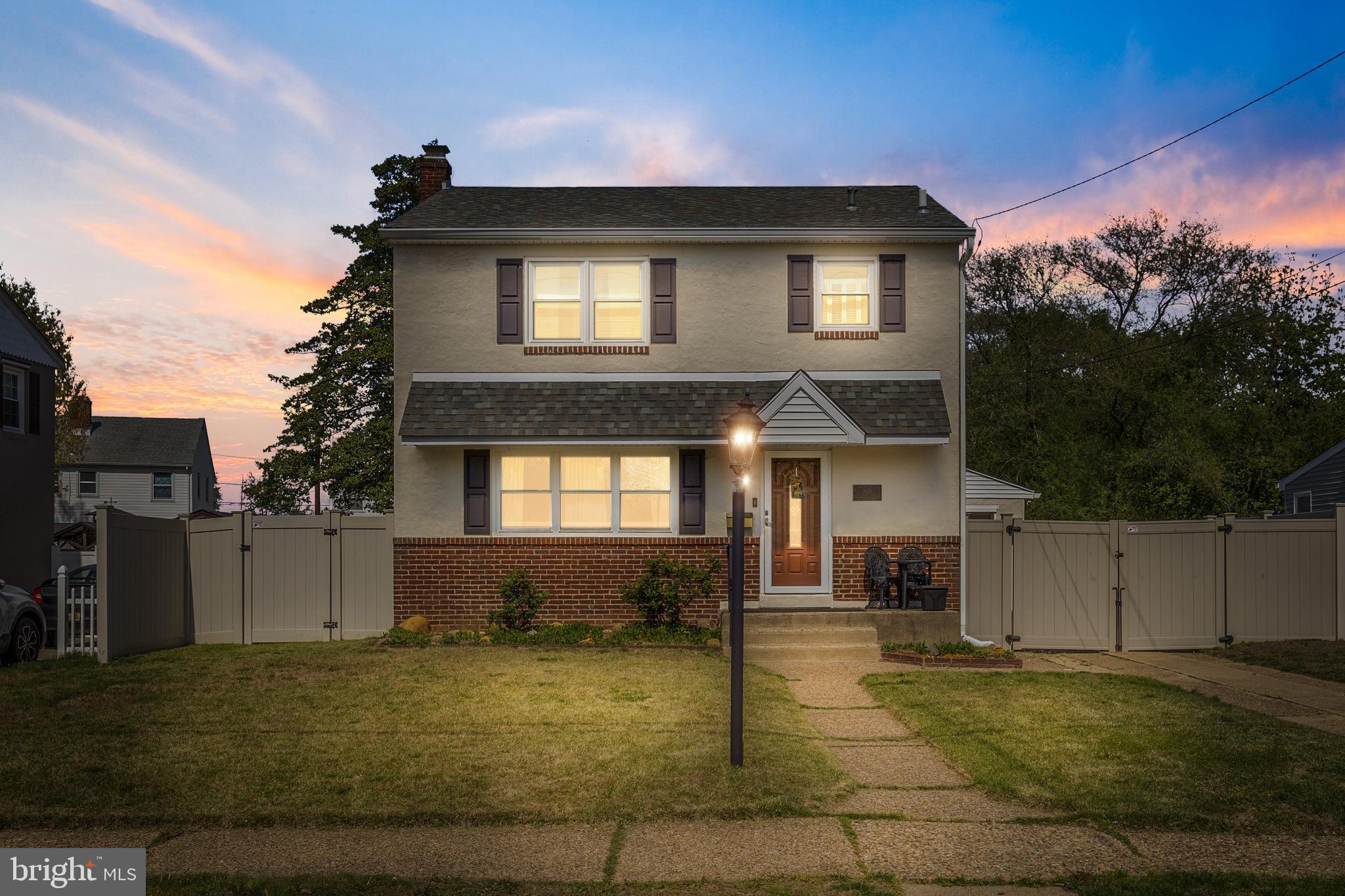 805 Delaware Avenue Riverside, NJ 08075 - Photo 1 of 42 a front view of a house with a yard