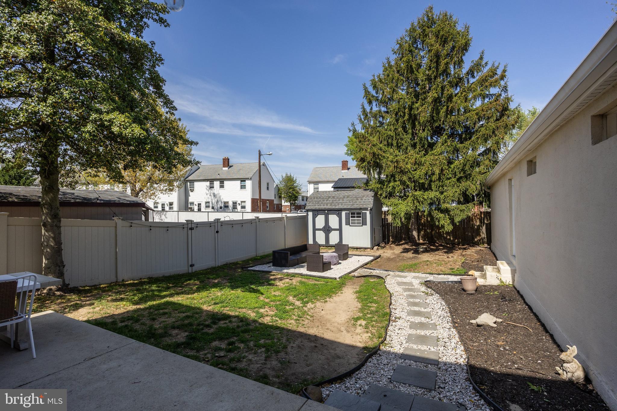 805 Delaware Avenue Riverside, NJ 08075 - Photo 26 of 42 a view of a house with backyard and sitting area