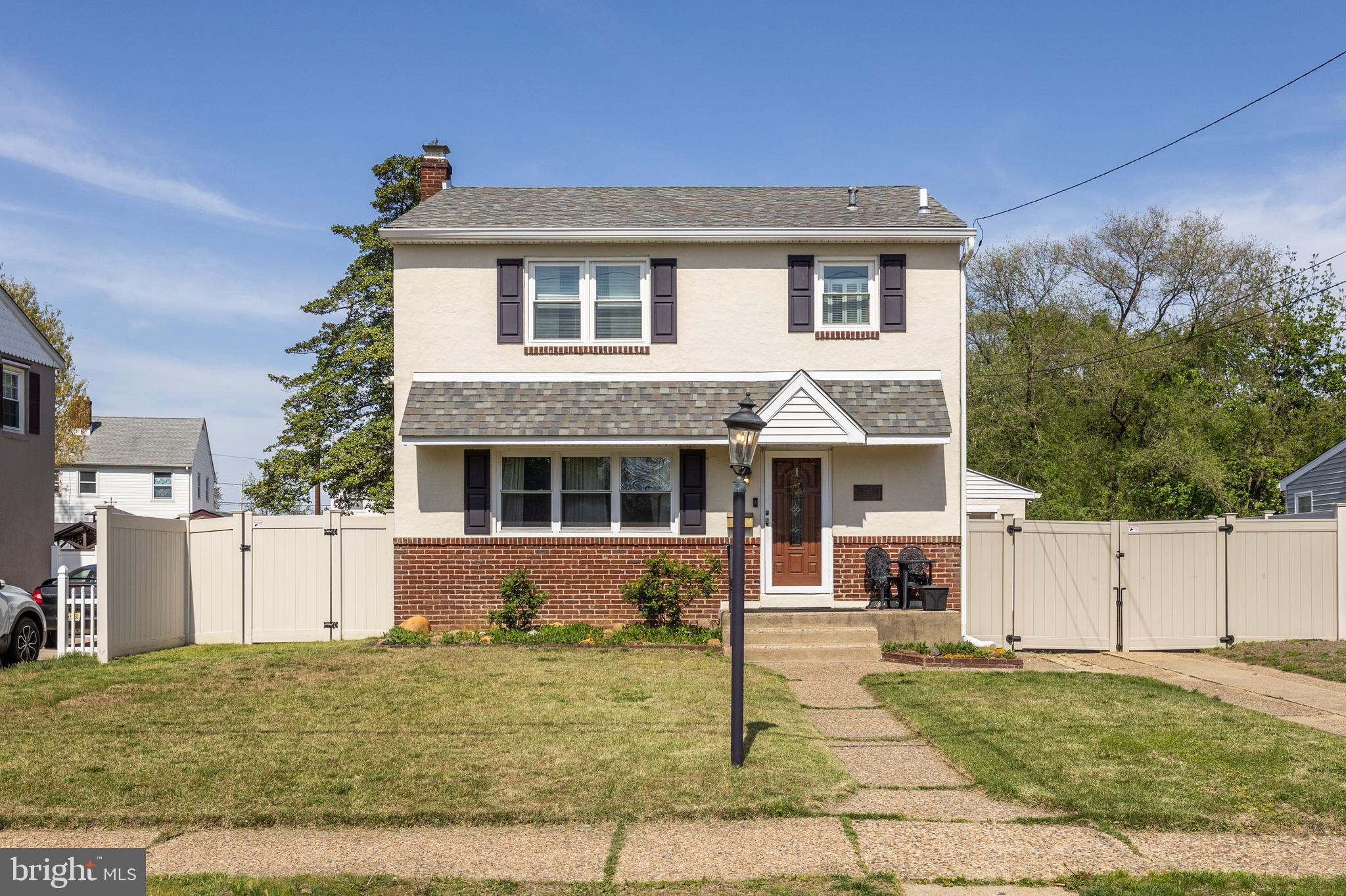 805 Delaware Avenue Riverside, NJ 08075 - Photo 40 of 42 a front view of a house with a yard
