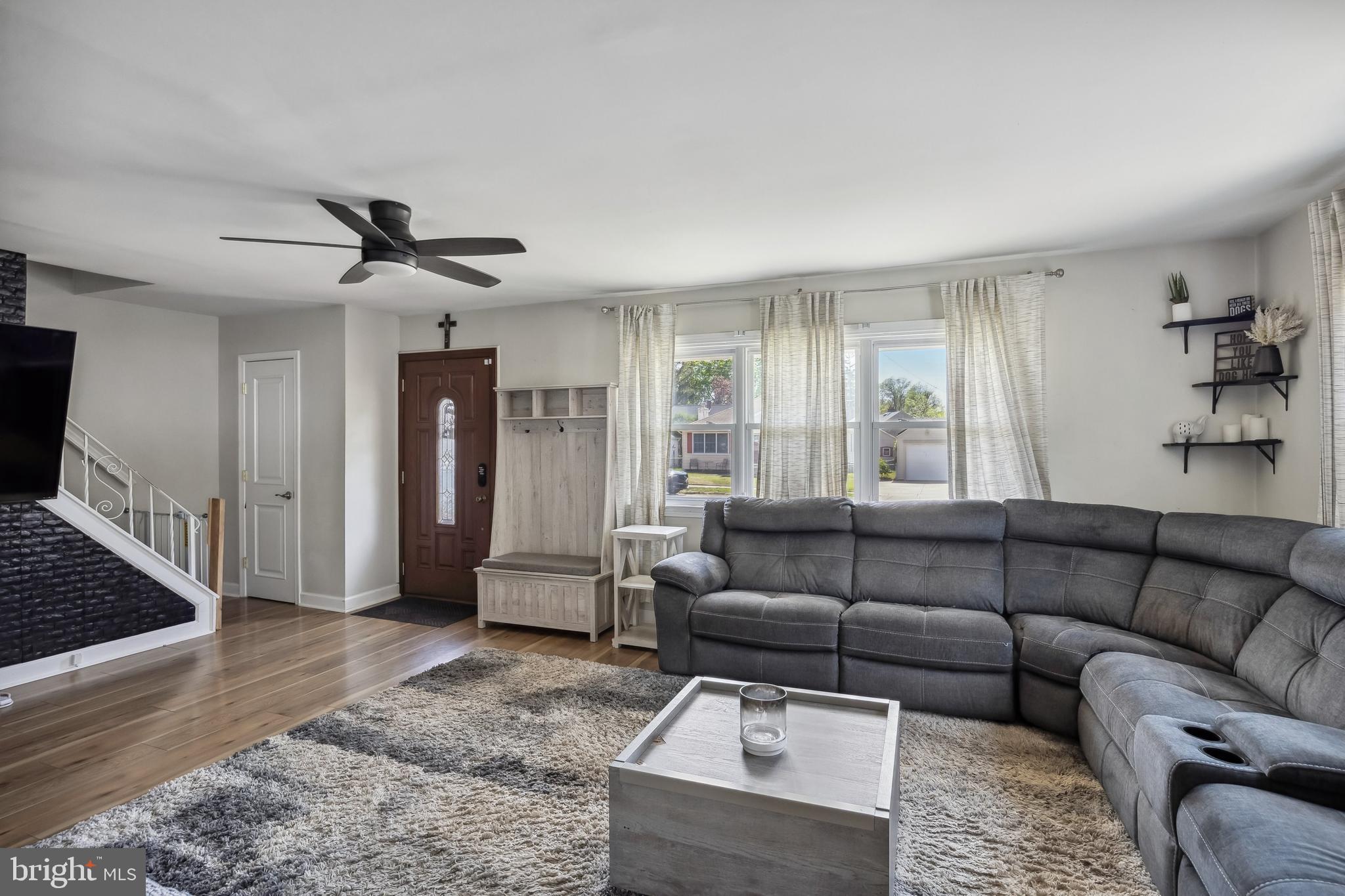 805 Delaware Avenue Riverside, NJ 08075 - Photo 4 of 42 a living room with furniture and a rug