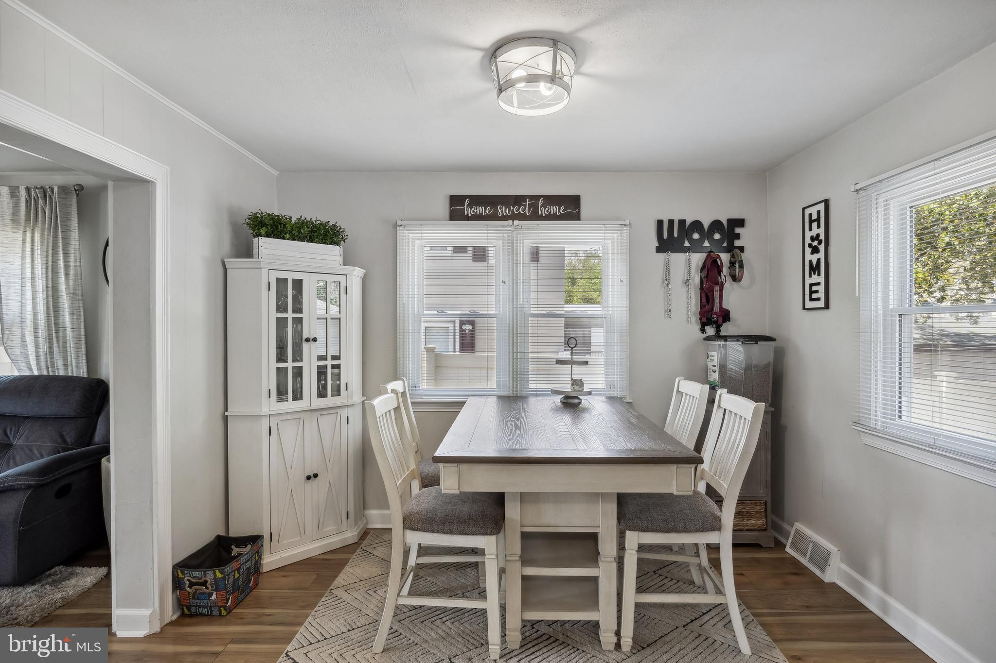 805 Delaware Avenue Riverside, NJ 08075 - Photo 7 of 42 a view of a dining room with furniture window and wooden floor