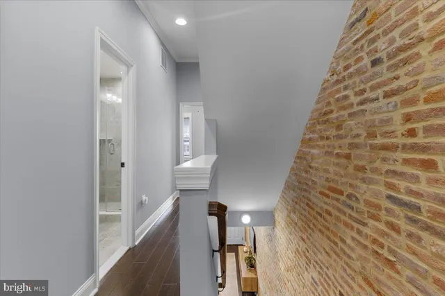 a bedroom with a bed and a chair