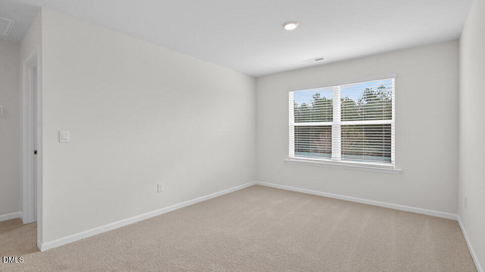 138 Fair Child Road Spring Lake, NC 28390 - Photo 19 of 45 an empty room with a window