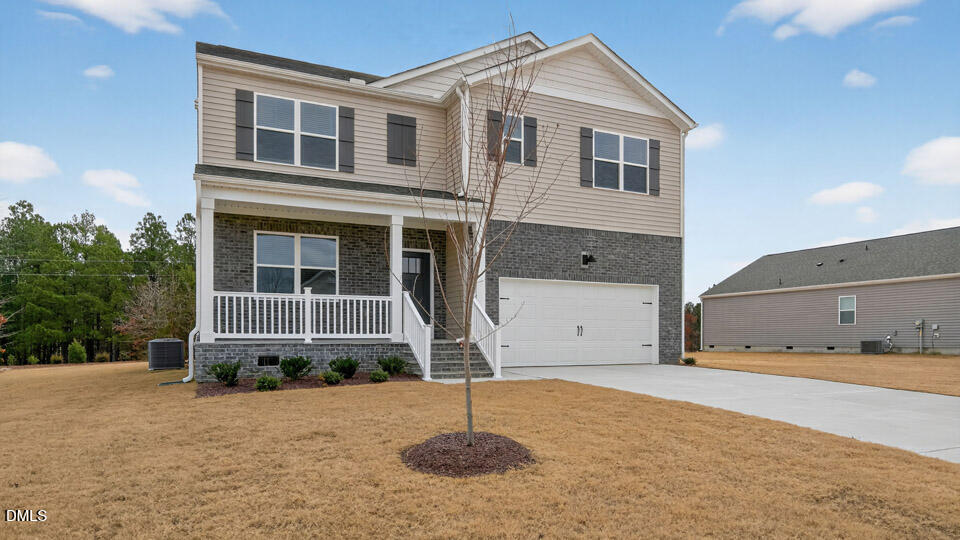 138 Fair Child Road Spring Lake, NC 28390 - Photo 2 of 45 a front view of a house with a yard