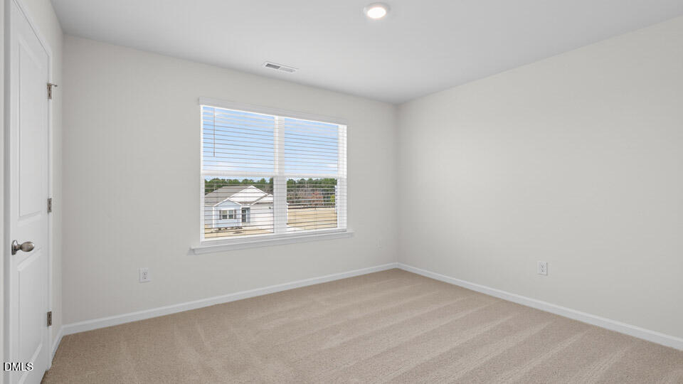 138 Fair Child Road Spring Lake, NC 28390 - Photo 24 of 45 an empty room with a window