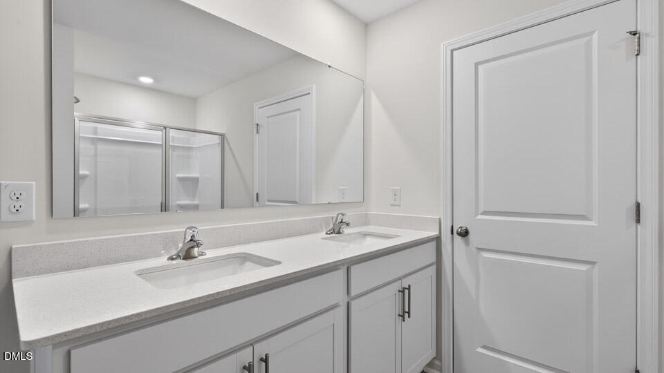 138 Fair Child Road Spring Lake, NC 28390 - Photo 31 of 45 a bathroom with a sink and a mirror