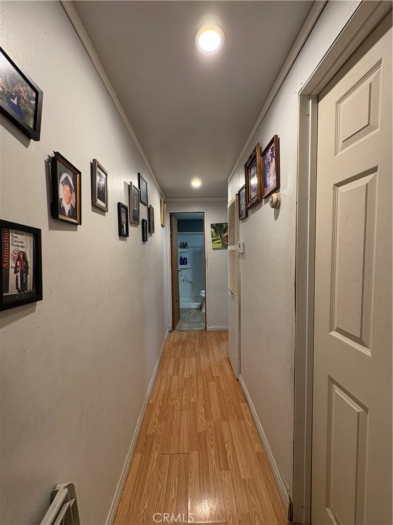 23500 The Old Road, Unit 37 Newhall, CA 91321 - Photo 12 of 22 a view of hallway with stairs