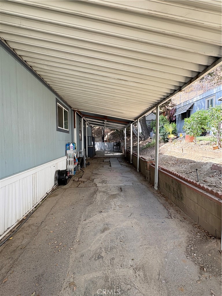 23500 The Old Road, Unit 37 Newhall, CA 91321 - Photo 4 of 22 a view of a garage