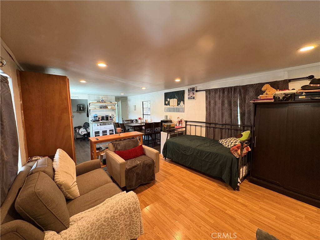 23500 The Old Road, Unit 37 Newhall, CA 91321 - Photo 5 of 22 a living room with furniture window and a couch