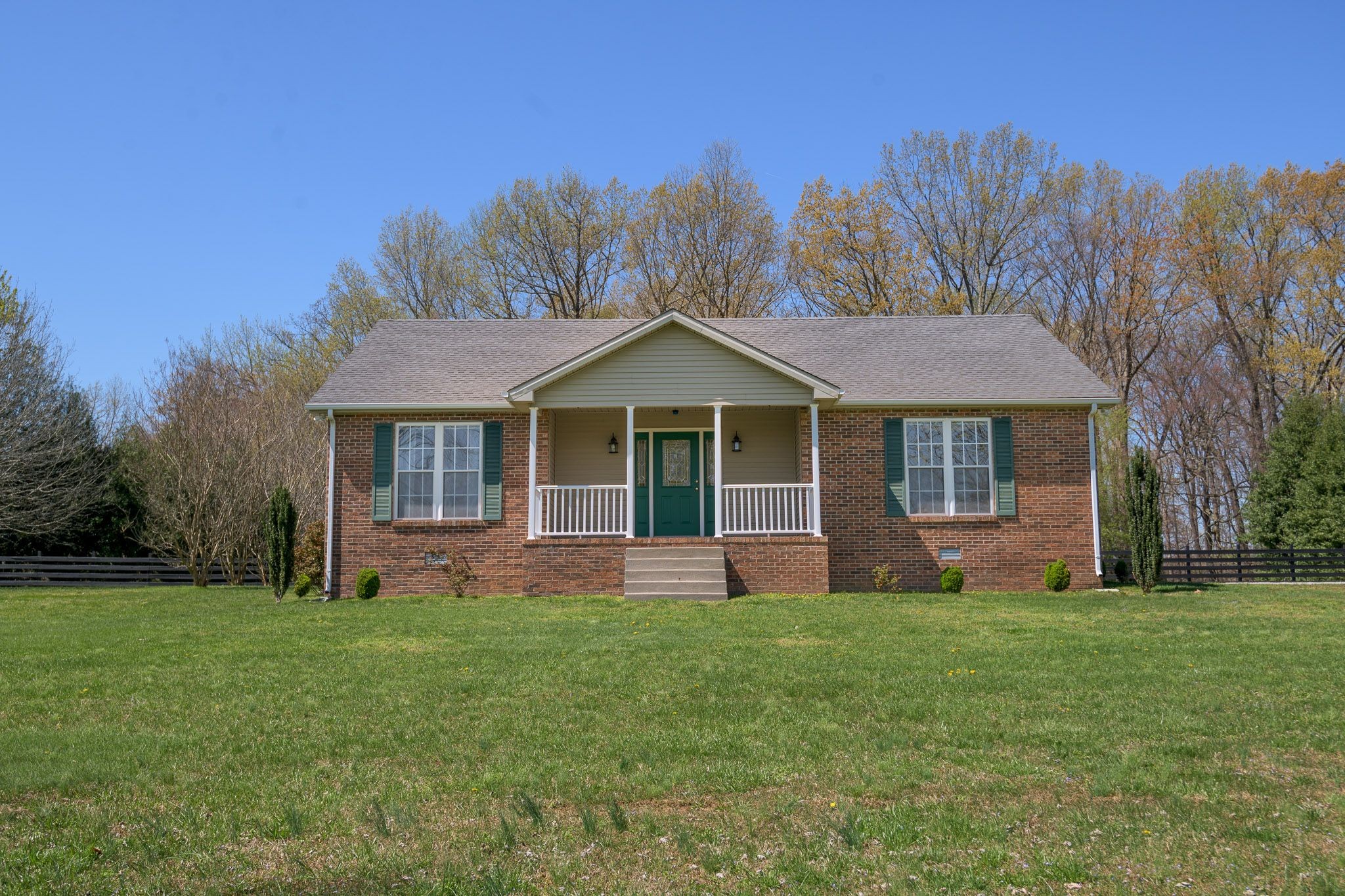 4165 Mt Zion Road Springfield, TN 37172 - Photo 1 of 42 a front view of a house with a yard and trees