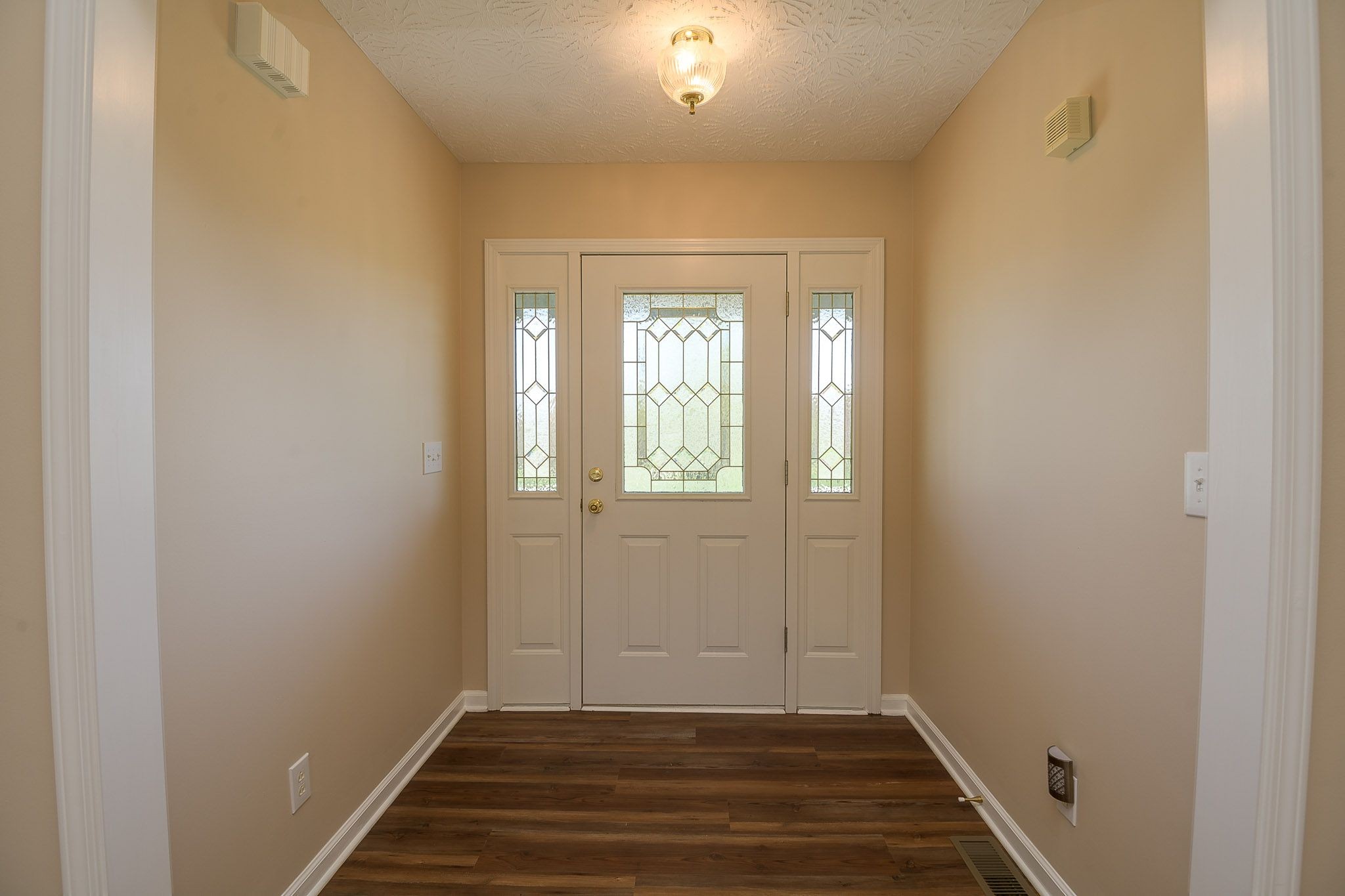 4165 Mt Zion Road Springfield, TN 37172 - Photo 19 of 42 a view of a hallway with wooden floor and a window
