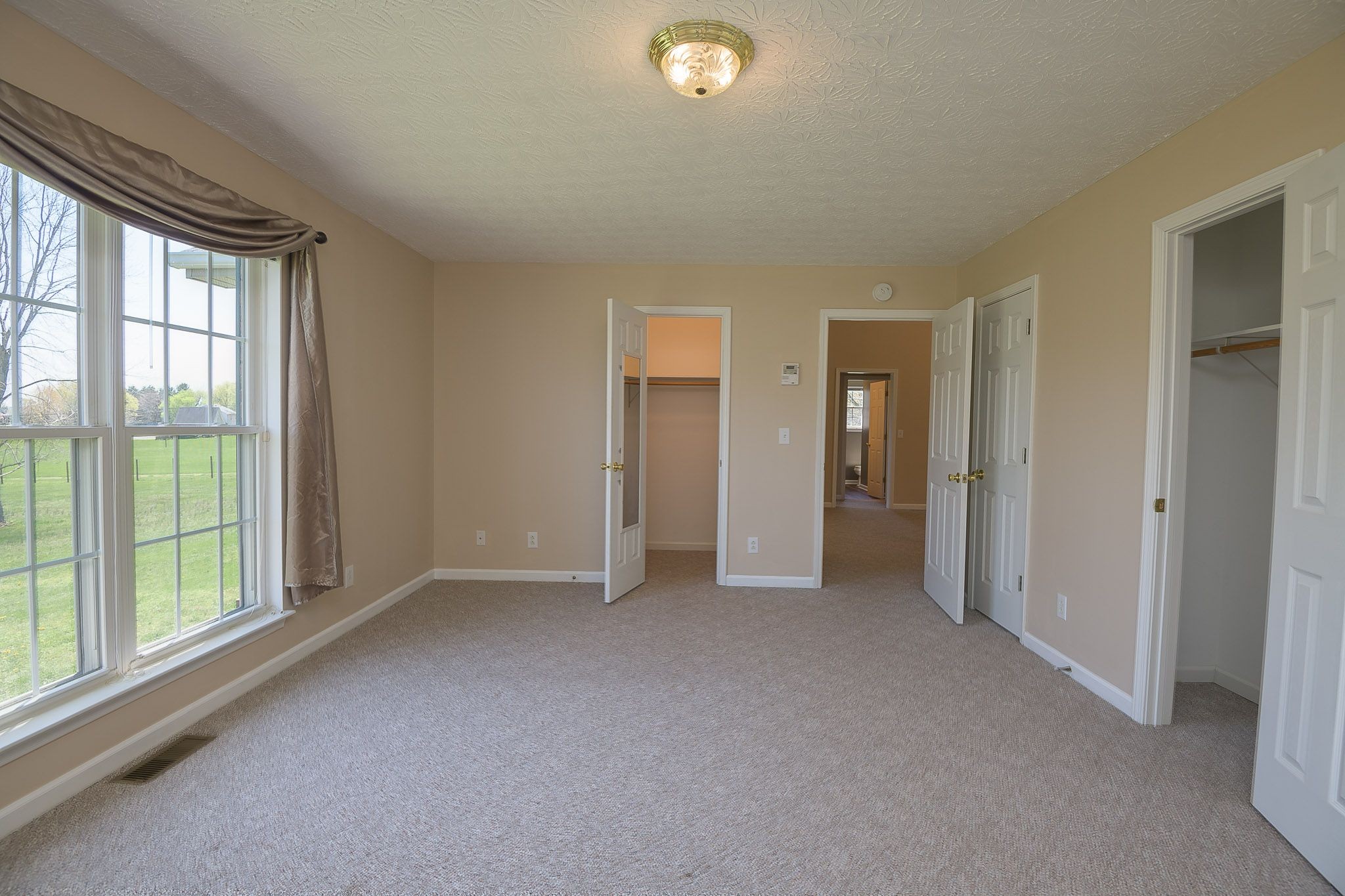 4165 Mt Zion Road Springfield, TN 37172 - Photo 30 of 42 a view of empty room with windows and ceiling fan