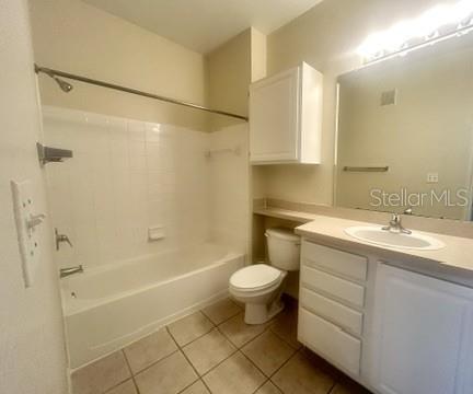 5807 Legacy Crescent Place, Unit 202 Riverview, FL 33578 - Photo 12 of 13 a bathroom with a sink toilet and shower