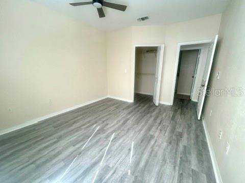 5807 Legacy Crescent Place, Unit 202 Riverview, FL 33578 - Photo 10 of 13 a view of a room with wooden floor