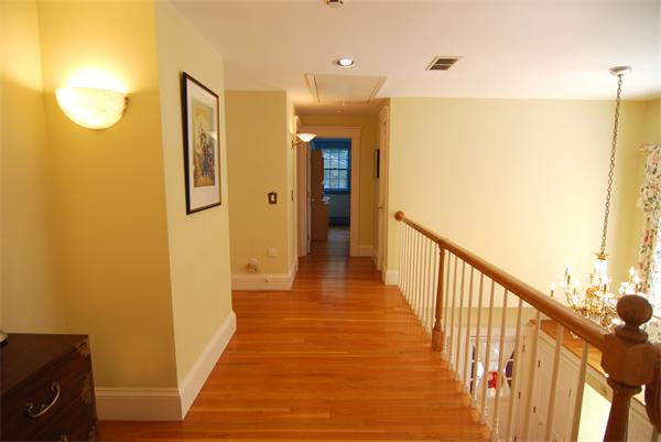 7 Mill Brook Road Lexington, MA 02420 - Photo 12 of 21 a view of a hallway with wooden floor