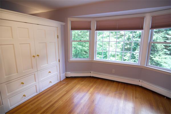 7 Mill Brook Road Lexington, MA 02420 - Photo 15 of 21 a view of room with window and wooden floor