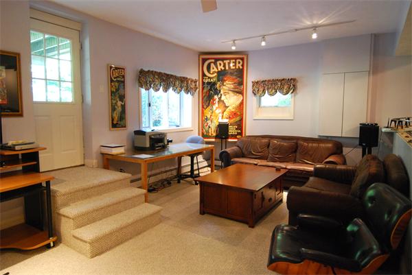 7 Mill Brook Road Lexington, MA 02420 - Photo 20 of 21 a living room with furniture and a large window