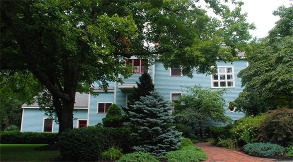7 Mill Brook Road Lexington, MA 02420 - Photo 2 of 21 a front view of a house with a tree