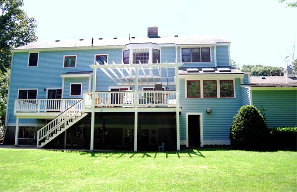 7 Mill Brook Road Lexington, MA 02420 - Photo 3 of 21 a front view of a house with a yard