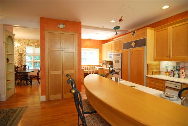 7 Mill Brook Road Lexington, MA 02420 - Photo 6 of 21 a dining room with stainless steel appliances a dining table and chairs