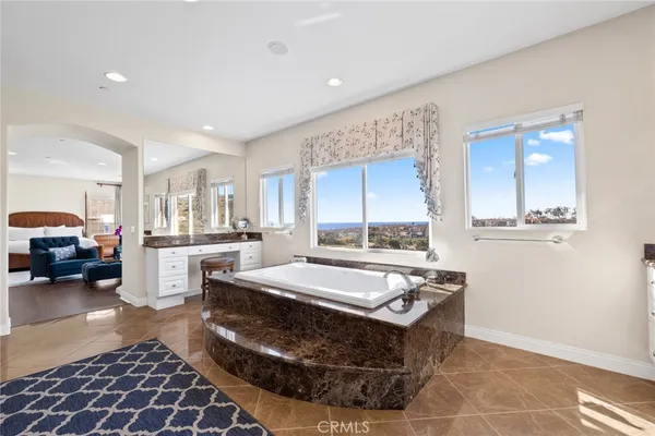 a view of a city with ocean view