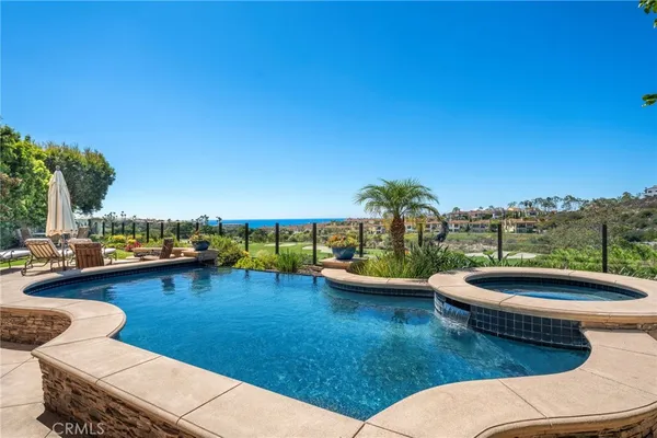 a view of a patio with swimming pool and patio