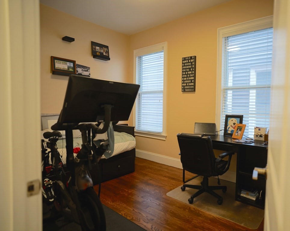 249 Lexington Street, Unit 2 Boston, MA 02128 - Photo 12 of 28 a view of a workspace with furniture and a window