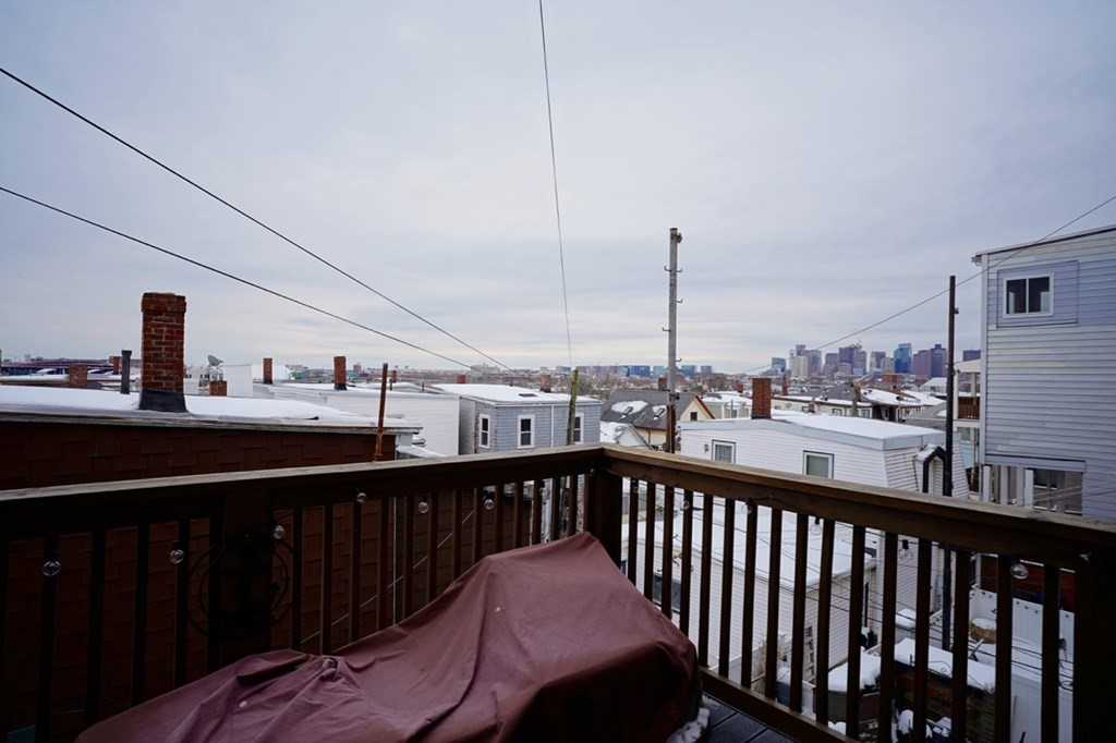 249 Lexington Street, Unit 2 Boston, MA 02128 - Photo 19 of 28 a view of a balcony with city view